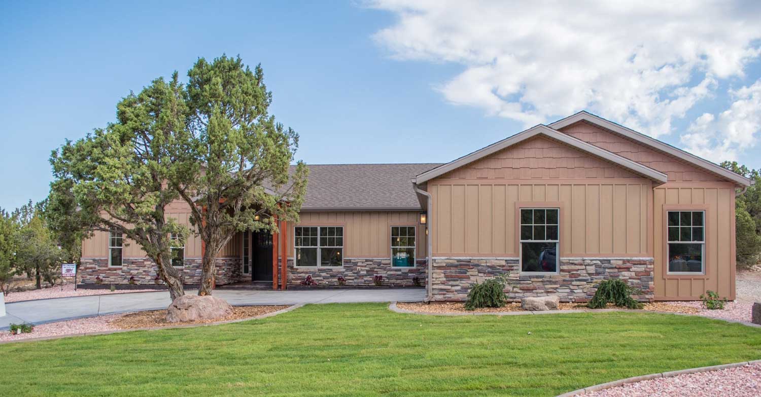master bedroom with attached master bath in custom home