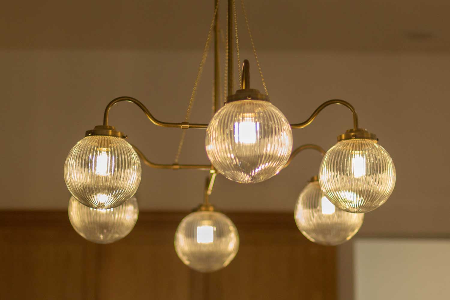 Chandelier with six glass globe lights
