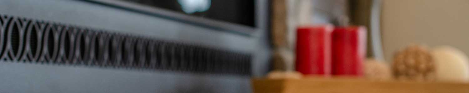 gas fireplace with stone hearth installed in new home