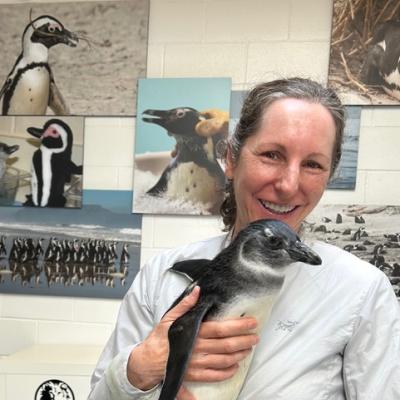 Lisa Lancaster with a penguin