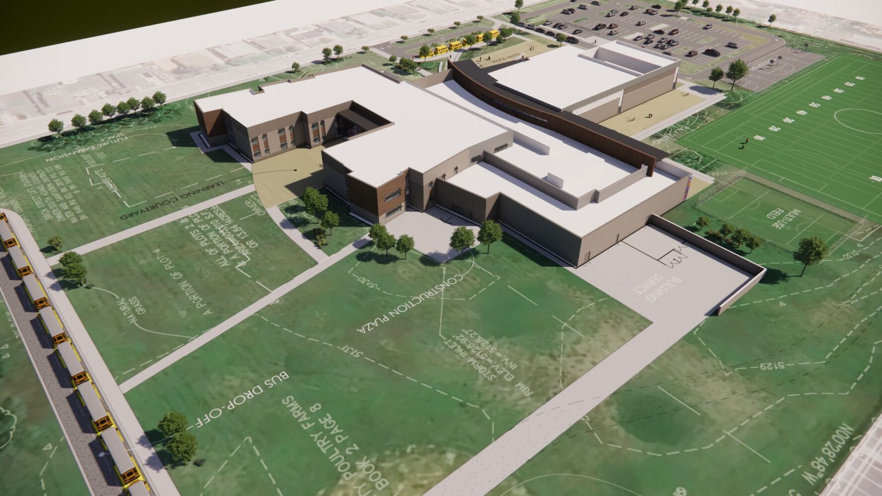 Aerial rendering of a junior high school campus showing interconnected building wings, landscaped courtyards, pathways, parking areas, bus drop‑off lane, and adjacent athletic fields.