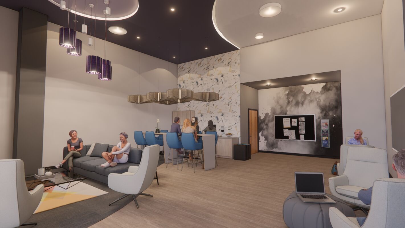Community room with lounge seating, upholstered chairs, café‑height tables, wood‑look flooring, sculptural pendant lighting, and accent walls featuring abstract patterns.